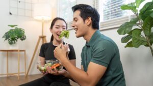 A couple sharing a nutritious meal in preparation to conceive